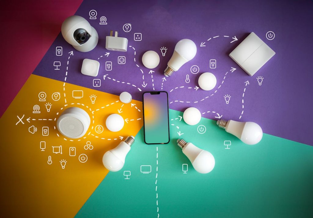 pexels-photo-19089175 Flat lay of smart home devices and smartphone showcasing automation and connectivity.